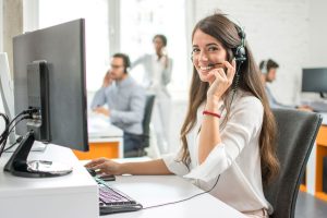 Woman answering calls at Grafters Head Office